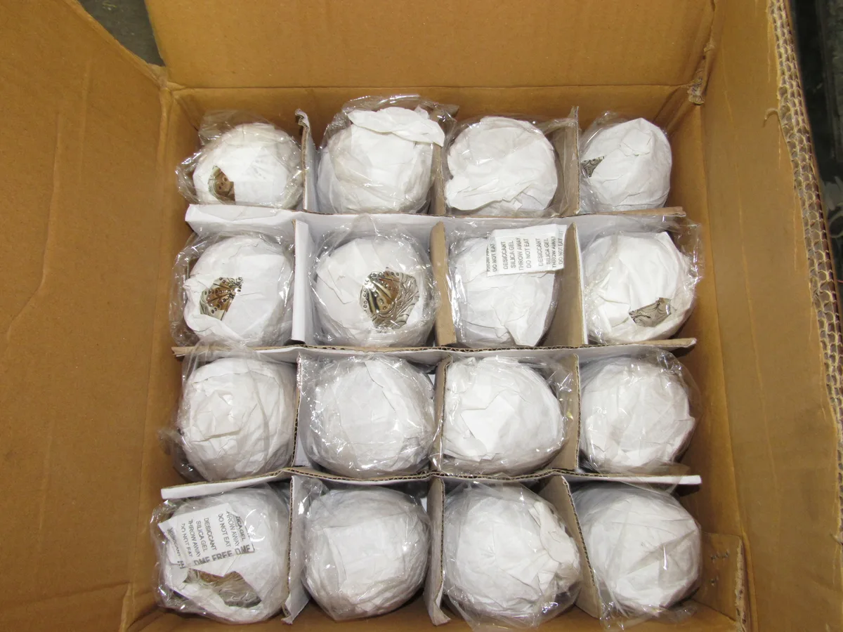 Decorative metal pieces individually protected inside an export carton